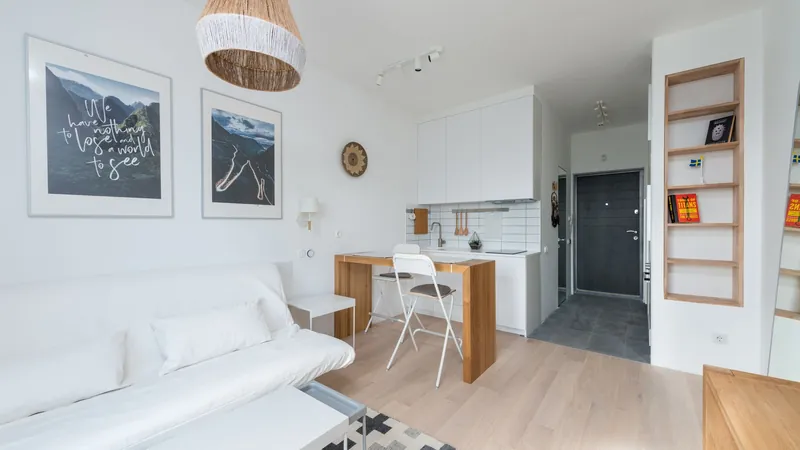 Small bright apartment with a living area and kitchen corner