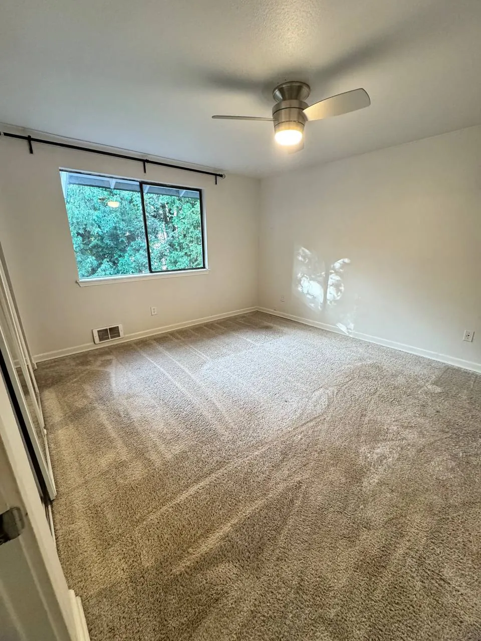After cleaning, same spot: Bedroom with ceiling fan