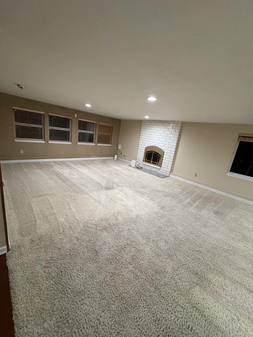 After cleaning, same spot: Living room with fireplace