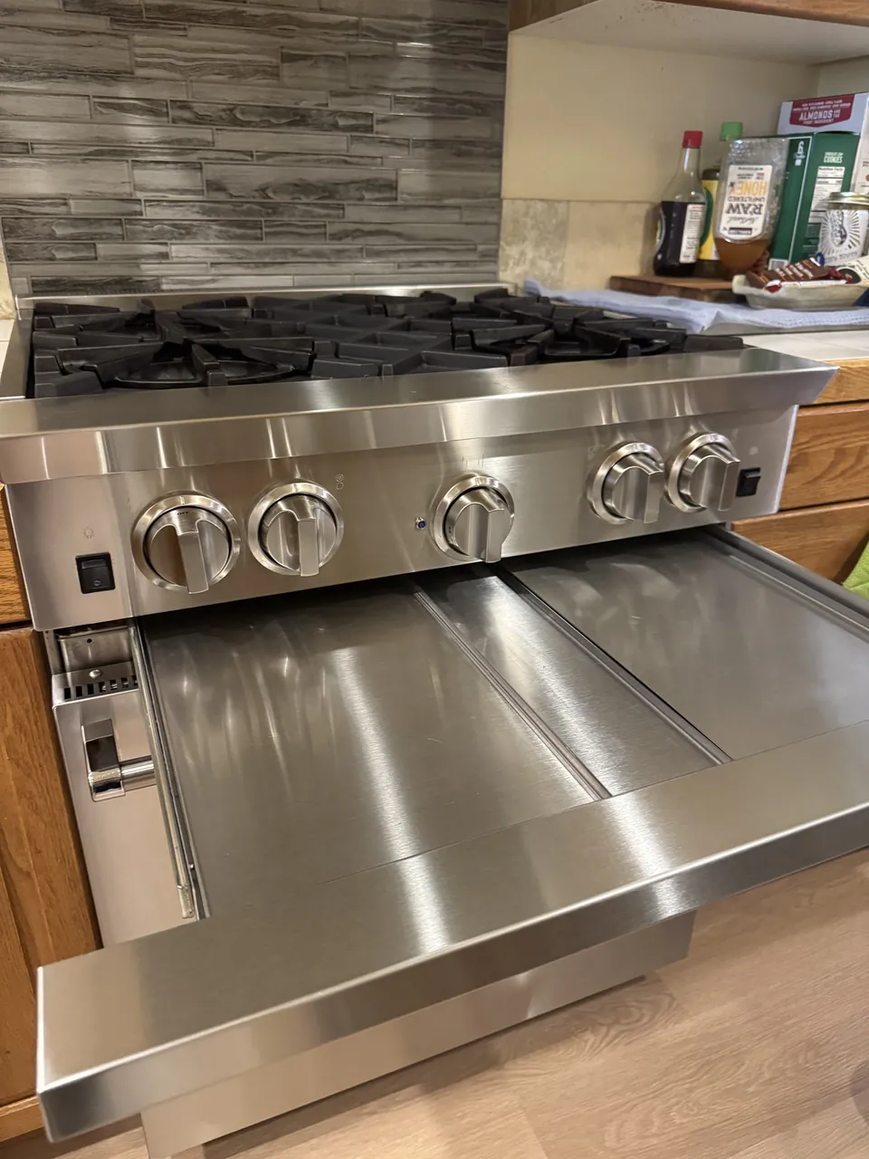 After cleaning, same spot: Kitchen · Range
