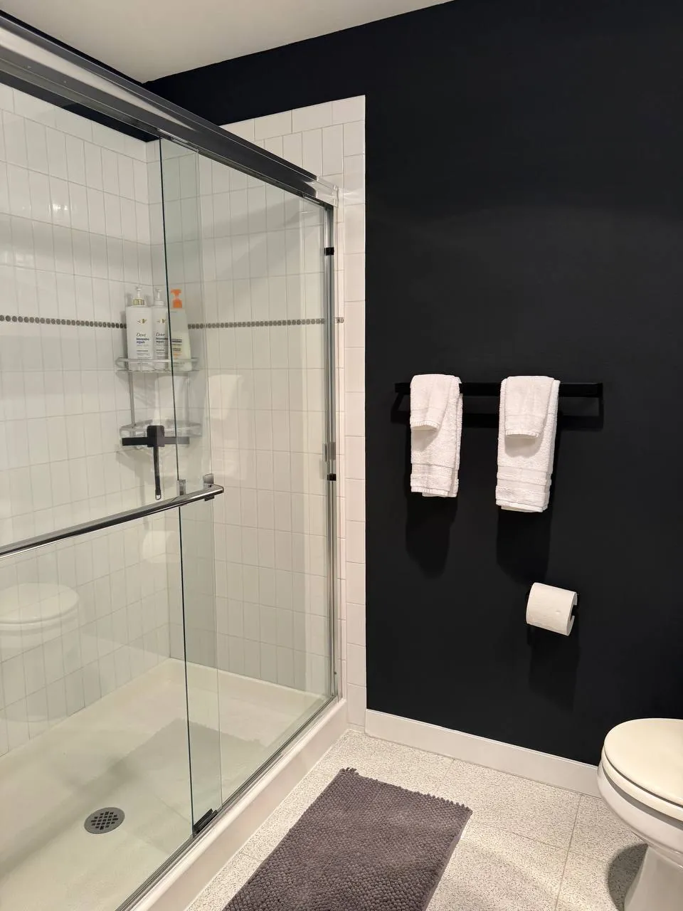After cleaning, same spot: Shower glass and tile