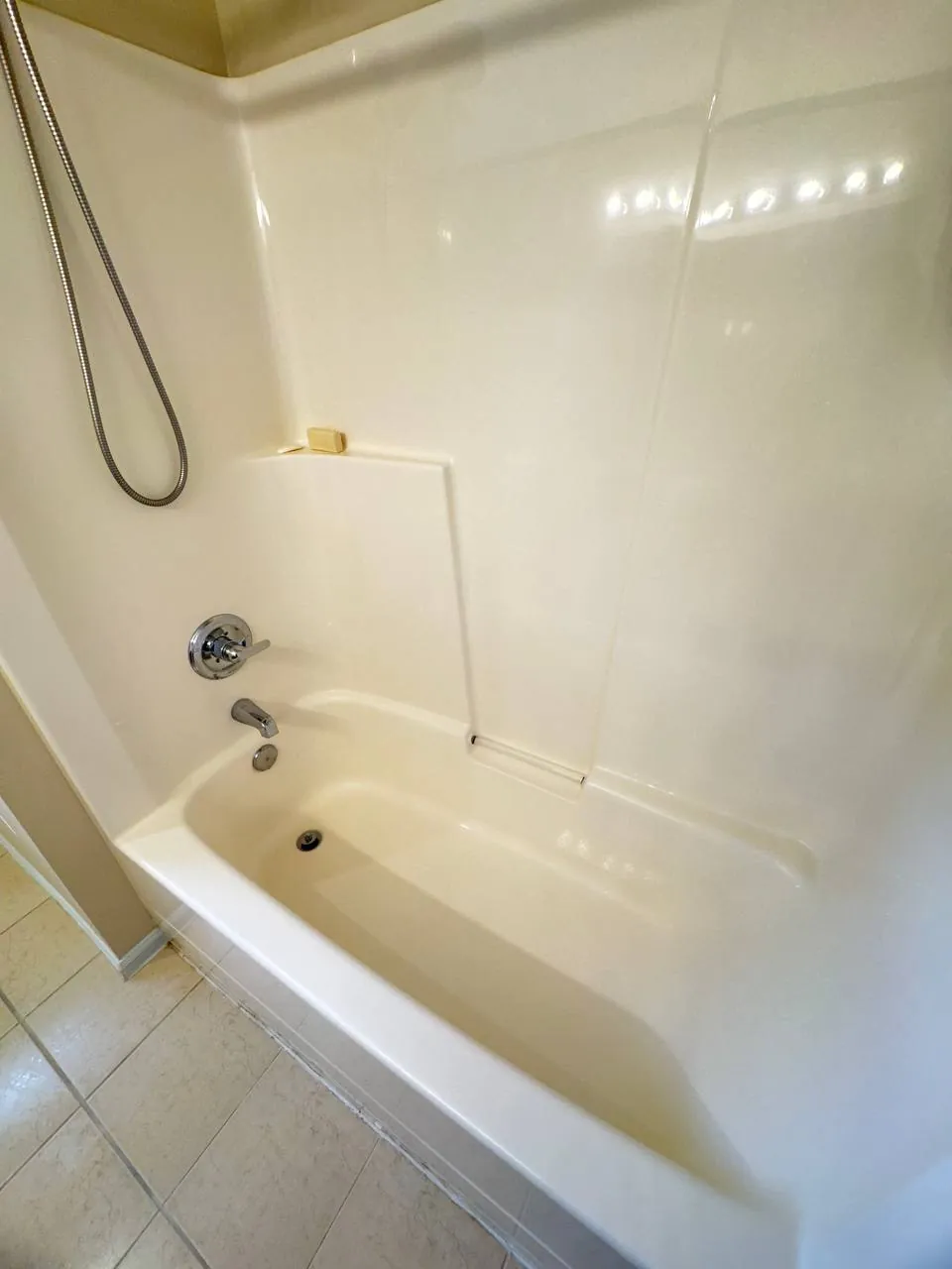 After cleaning, same spot: Tub and shower walls