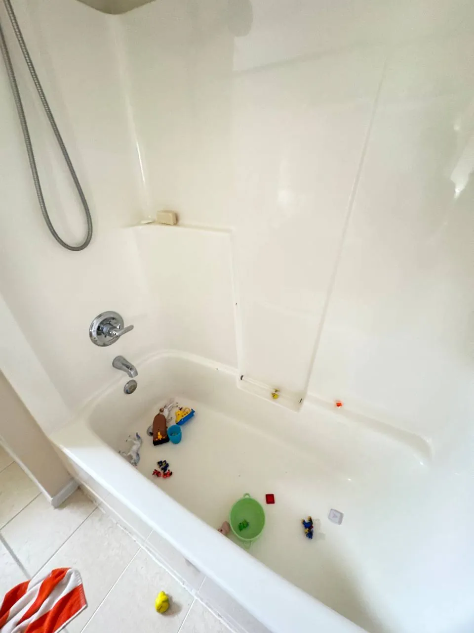 Before: bathtub and shower surround