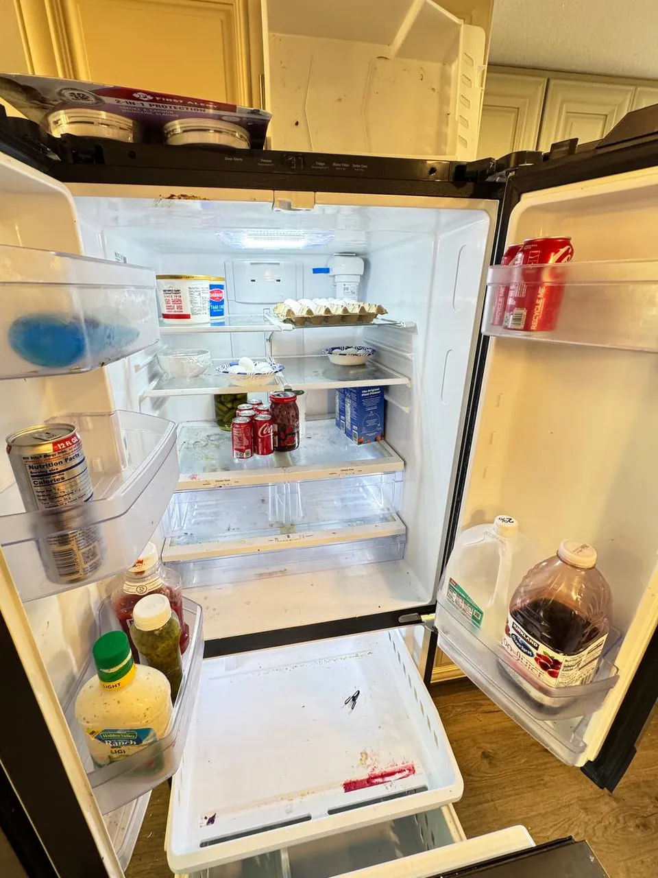 Before: French-door refrigerator interior, shelves and door bins
