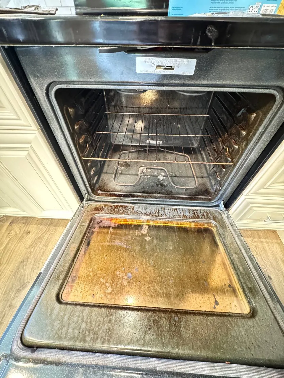 Before: oven interior and inside of the open door