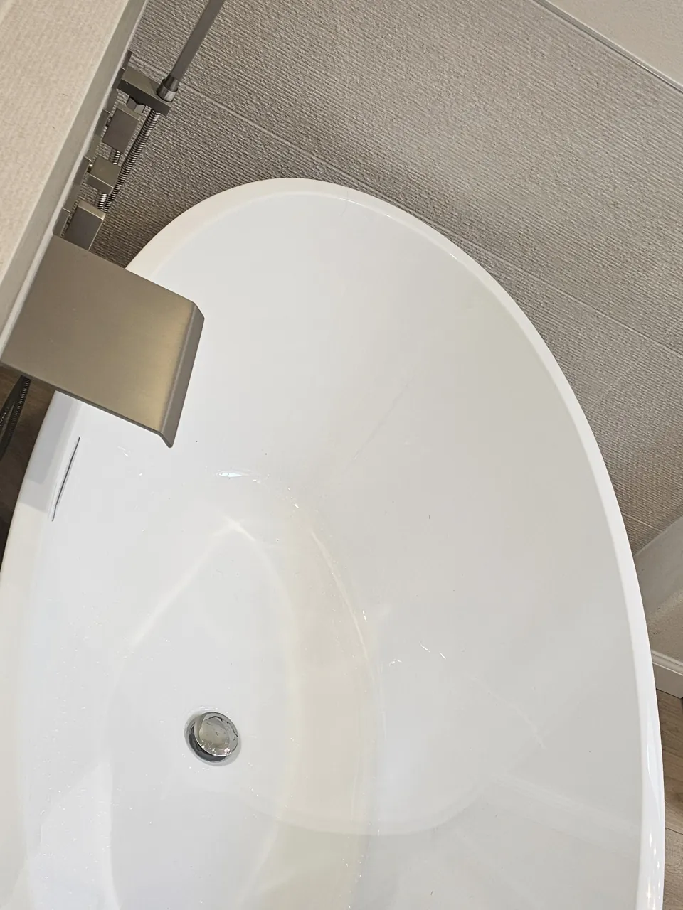 After cleaning, same spot: Bathroom · Glass