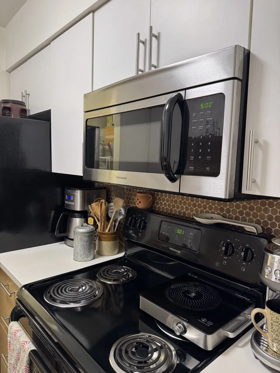 After cleaning, same spot: Kitchen counter and range