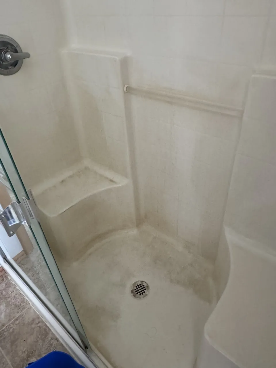 Before: shower stall base and walls